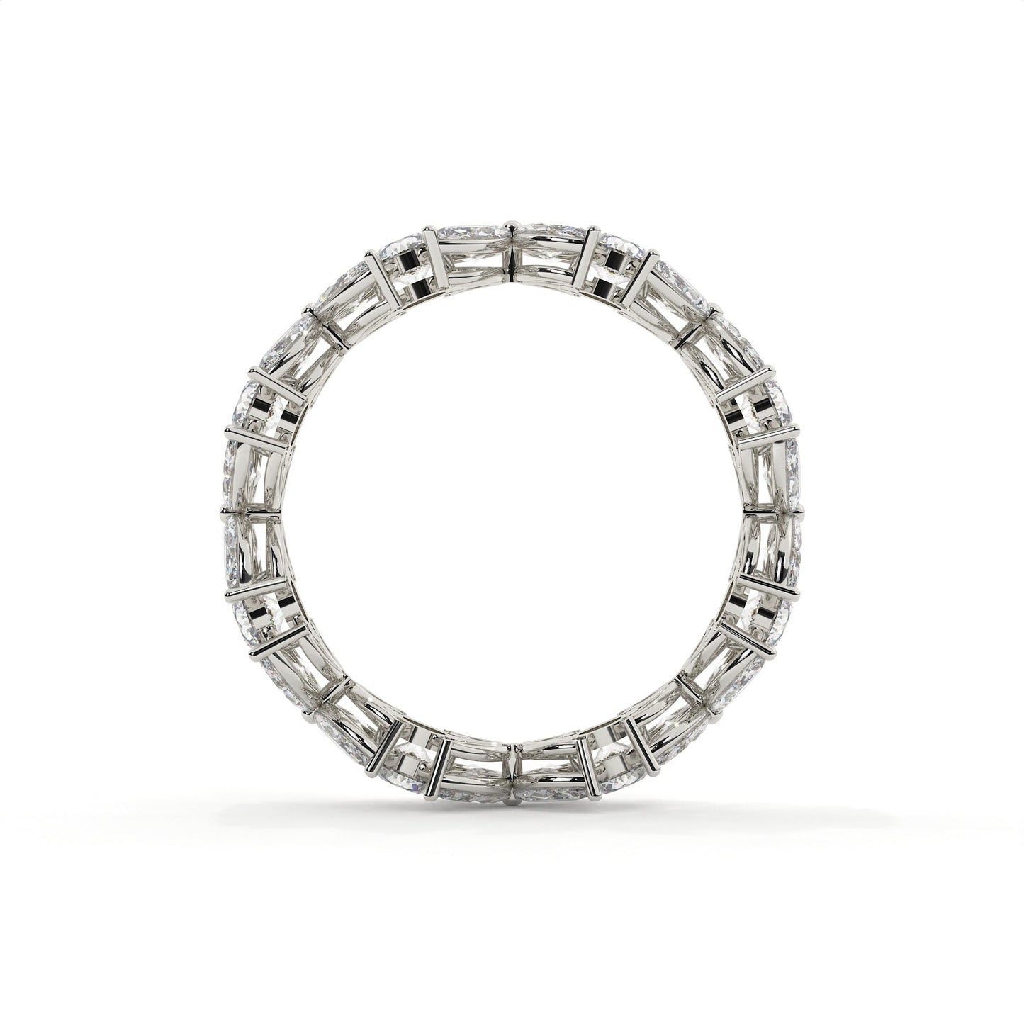 Diamond ring with baguette and round cut stones on a white background