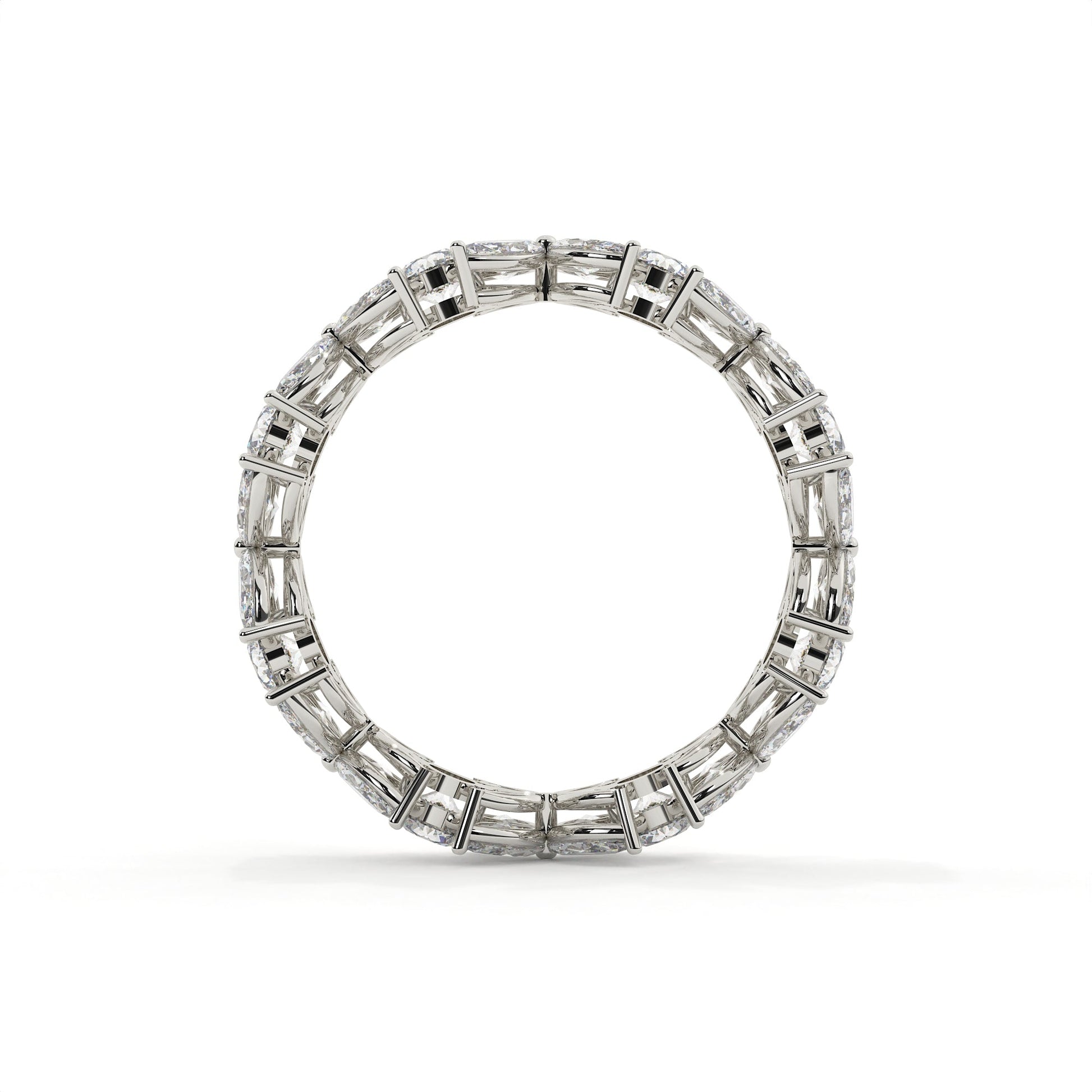 Diamond ring with baguette and round cut stones on a white background