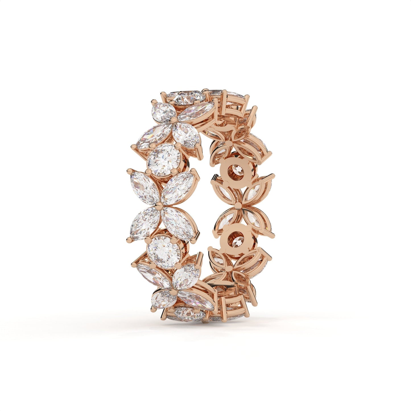 Rose gold ring with diamond accents on a white background