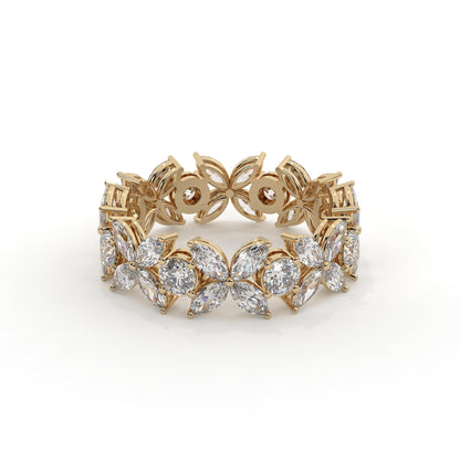 Gold bracelet with diamond accents on a white background