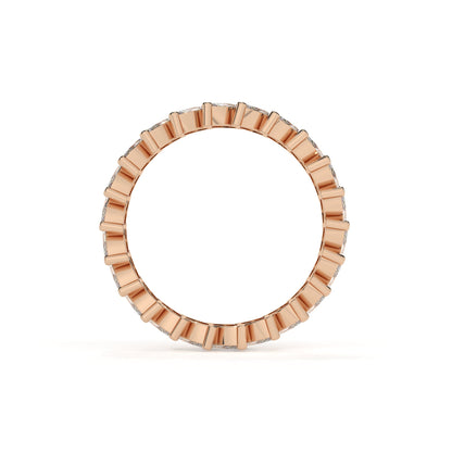 Rose gold ring with a unique design on a white background