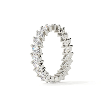 Silver ring with diamond accents on a white background