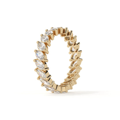 Gold ring with diamonds on a white background