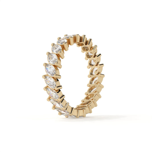 Gold ring with diamonds on a white background