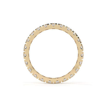 Gold ring with small diamonds on a white background