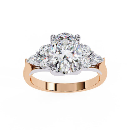 Rose gold ring with a large central diamond and smaller diamonds on a white background