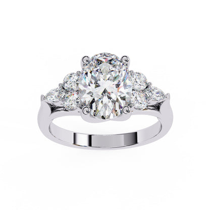 Diamond ring with three circular diamonds on a white background