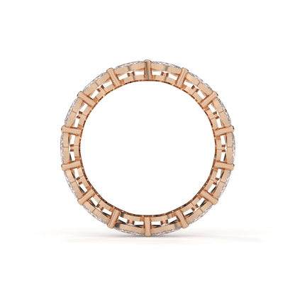 Rose gold ring with a lattice design on a white background