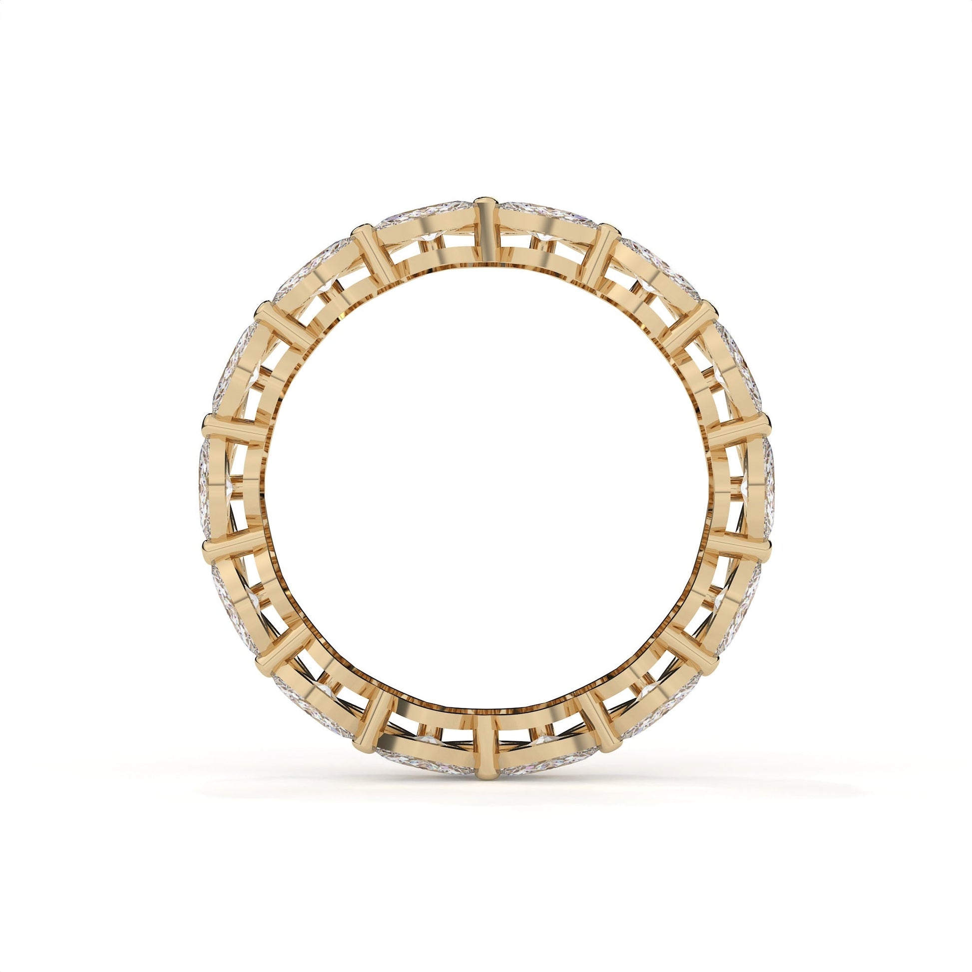 Gold ring with a geometric design on a white background