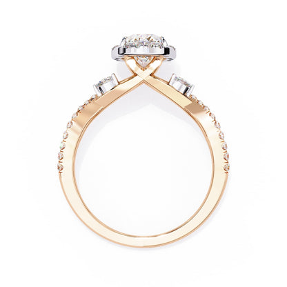 Rose gold ring with diamond accents on a white background
