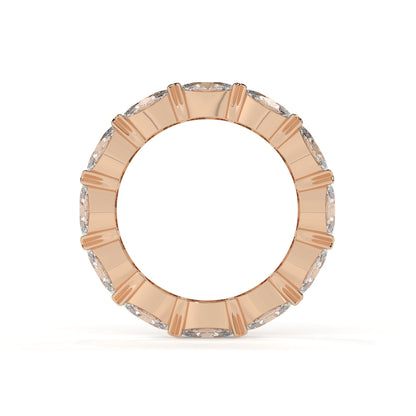 Rose gold ring with diamond accents on a white background