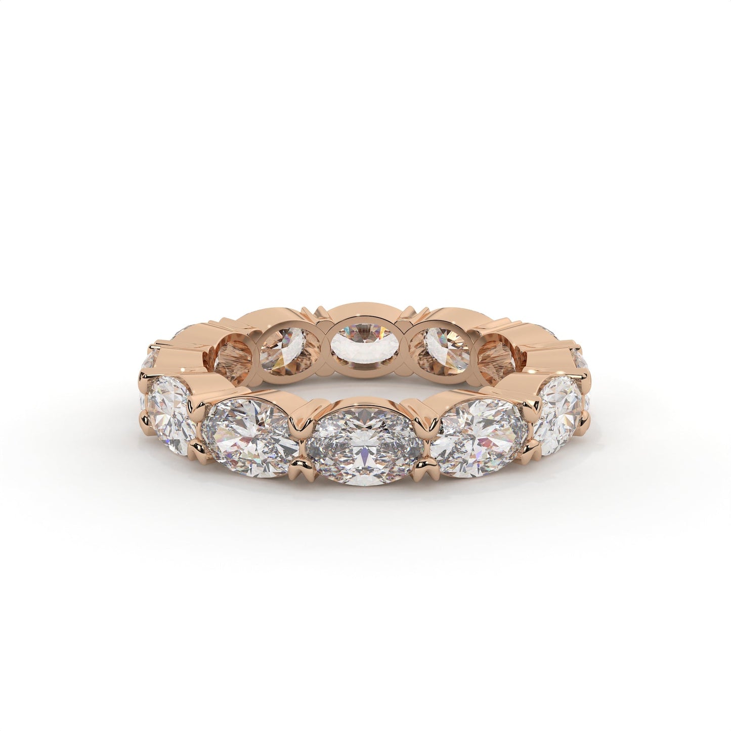 Rose gold ring with multiple diamonds on a white background