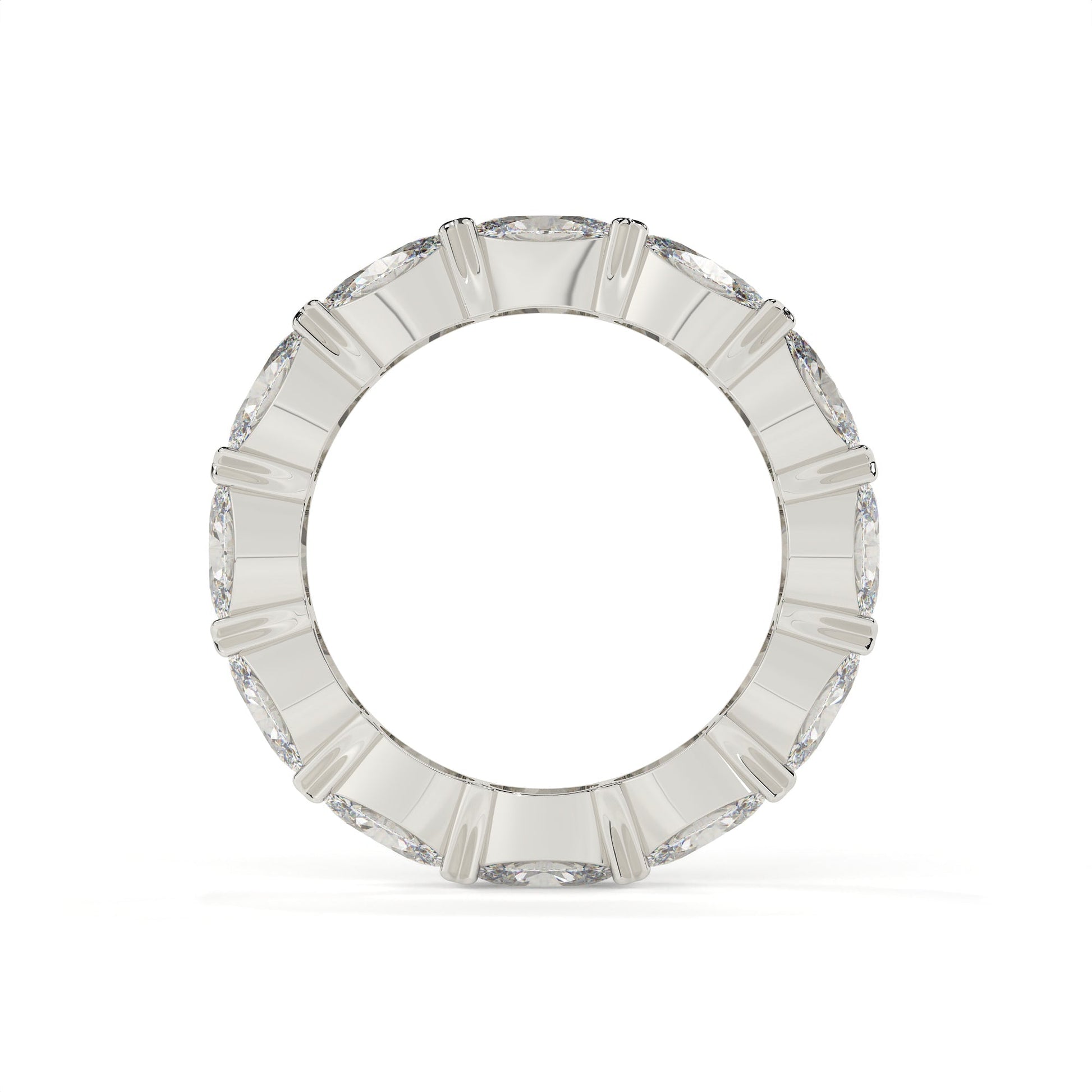 Silver ring with rectangular gemstones on a white background