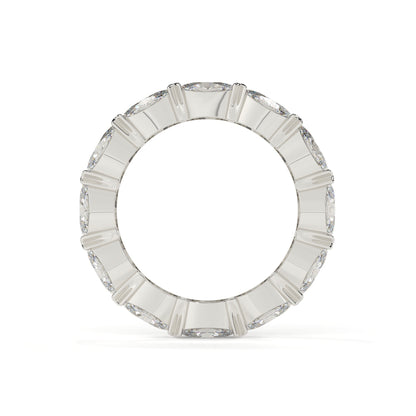 Silver ring with rectangular gemstones on a white background