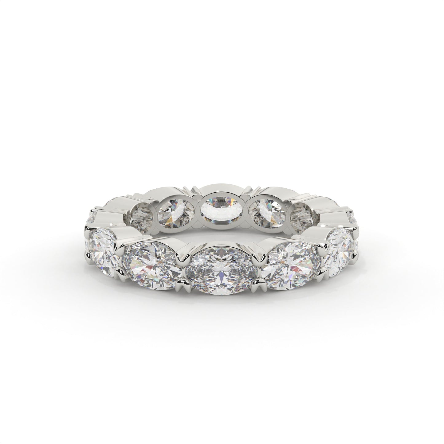 Silver ring with multiple diamonds on a white background