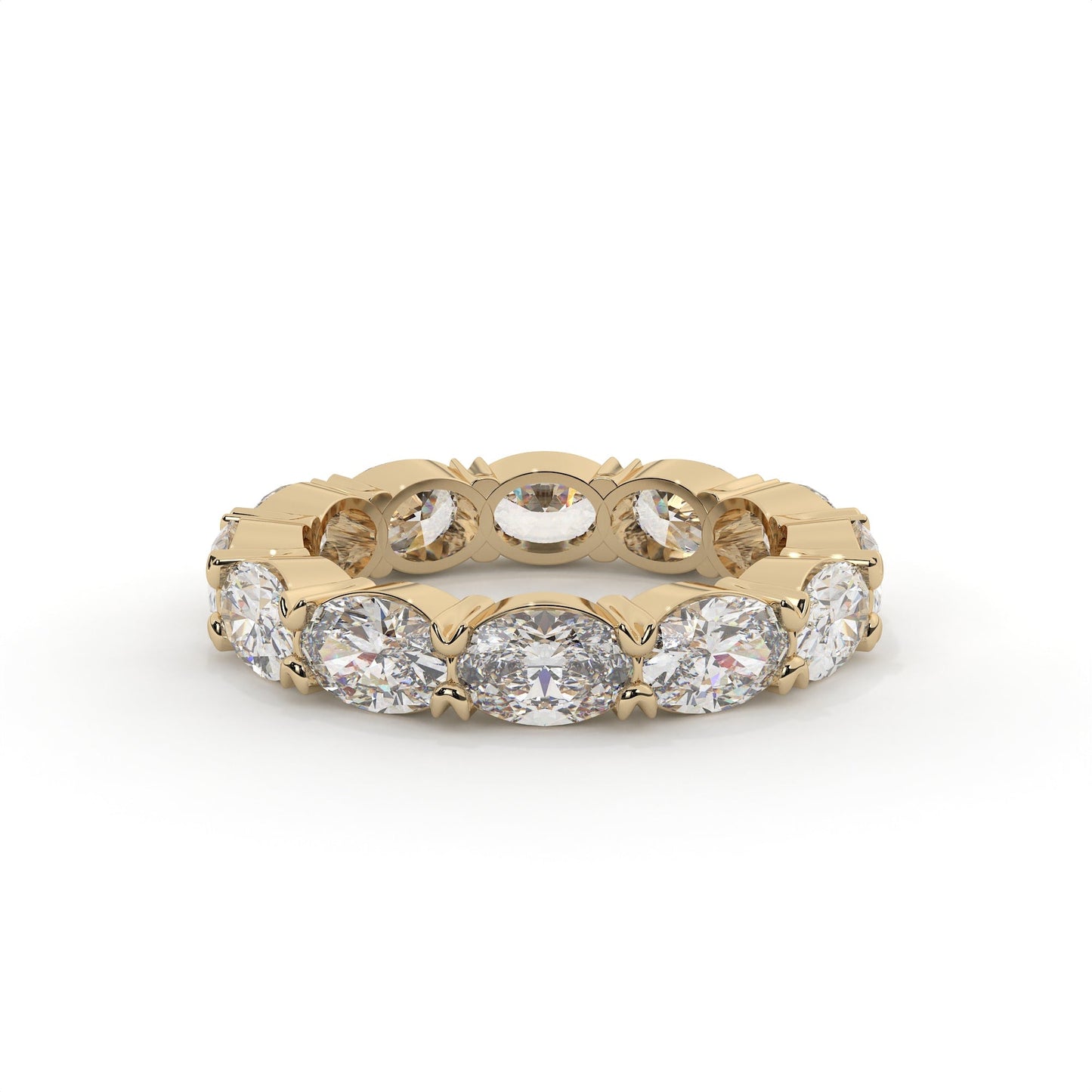 Gold ring with embedded diamonds on a white background