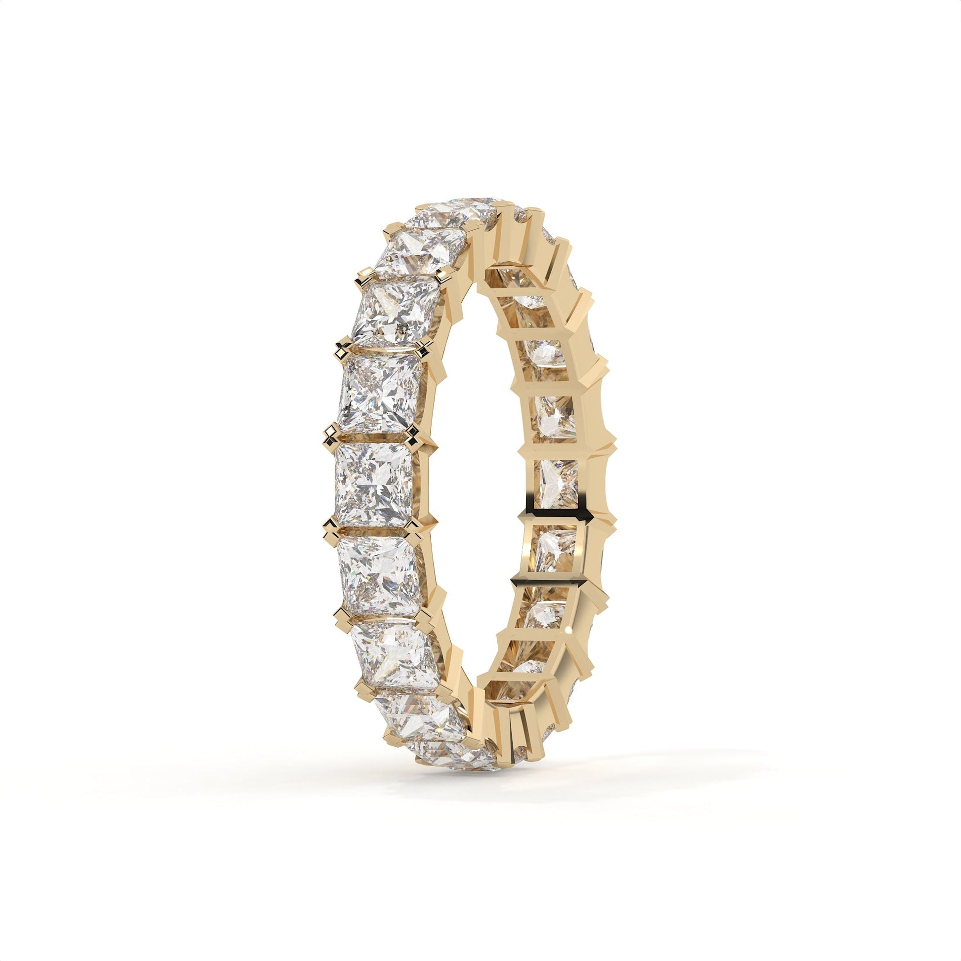 Gold ring with diamond stones on a white background