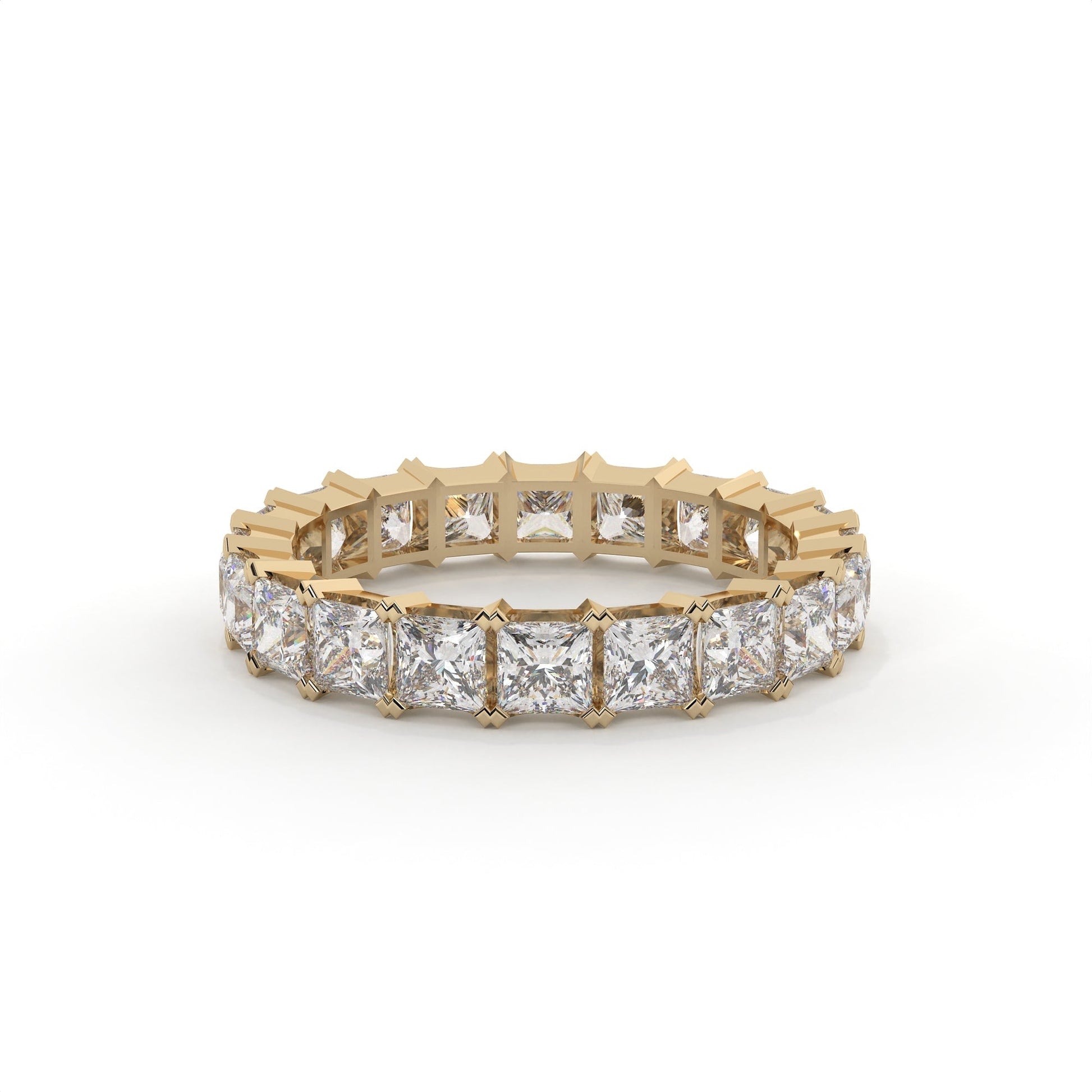 Gold ring with diamond stones on a white background