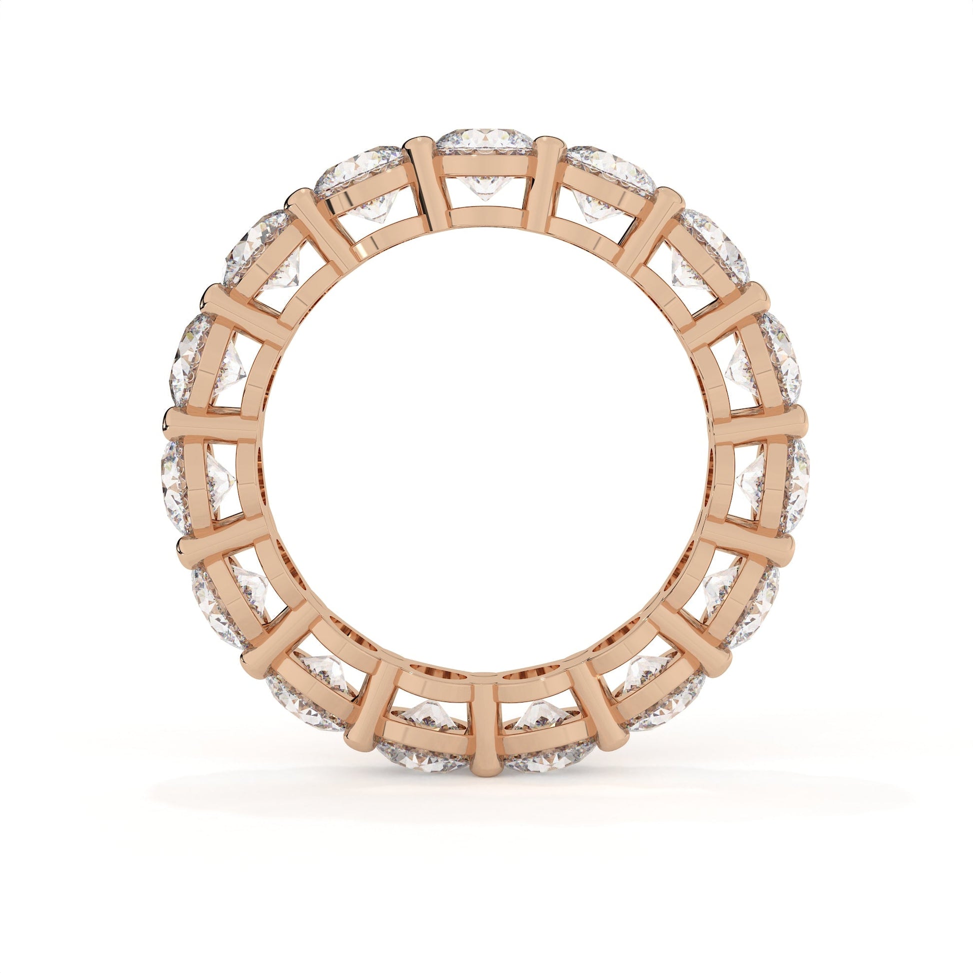Rose gold ring with diamond accents on a white background