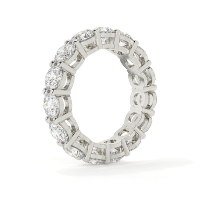 Diamond ring with a white gold band on a white background