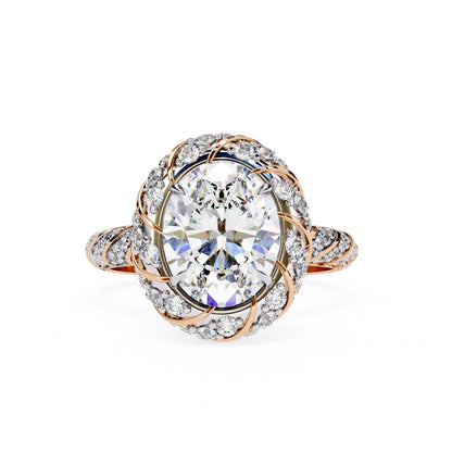 Rose gold ring with a large diamond and smaller diamonds on the band against a white background